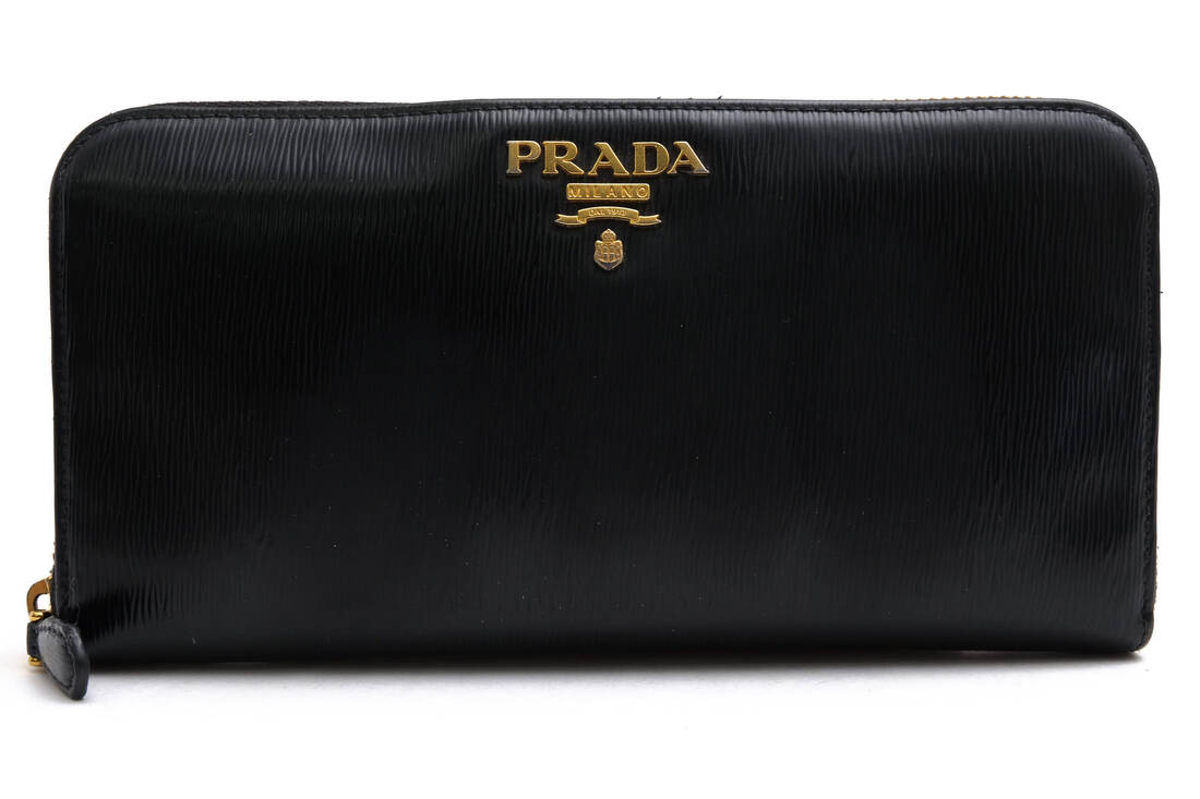 PRADA 長紙入れ プラダ 1ML506 PORTAFOGLIO LAMPO VITELLO MOVE カーフレザー 牛皮  御釣り入れあり ラウンドジップ ラウンドジッパー 【中古】