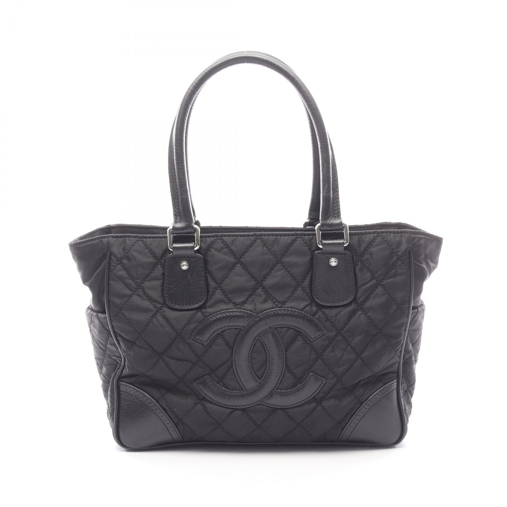 ≪5%OFFクーポン＆まとめ買い10% ～7/26 9:59〆≫シャネル CHANEL パリニューヨークライン トートバッグ バッグ ナイロン レザー レディース ブラック系 A33100 【中古】｜BRANDOFF TOKYO