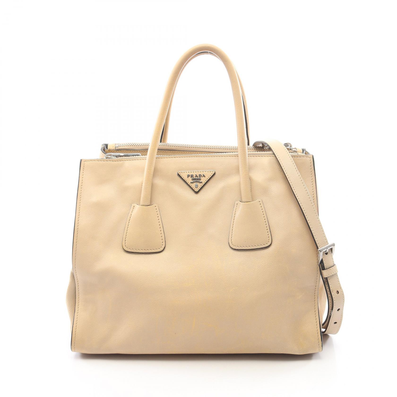 プラダ PRADA トライアングルロゴ 2WAY トートバッグ バッグ レザー レディース ベージュ系 【中古】｜BRANDOFF TOKYO 40,950円