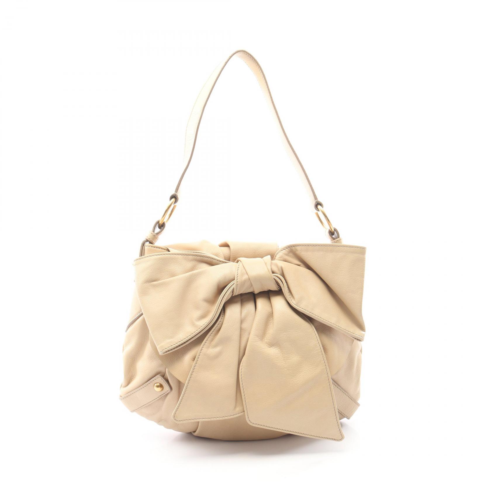 イヴサンローランリヴゴーシュ Yves Saint Laurent rive gauche サック ボウ リボン ショルダーバッグ バッグ レザー レディース ベージュ系 【中古】｜Brandoff銀座