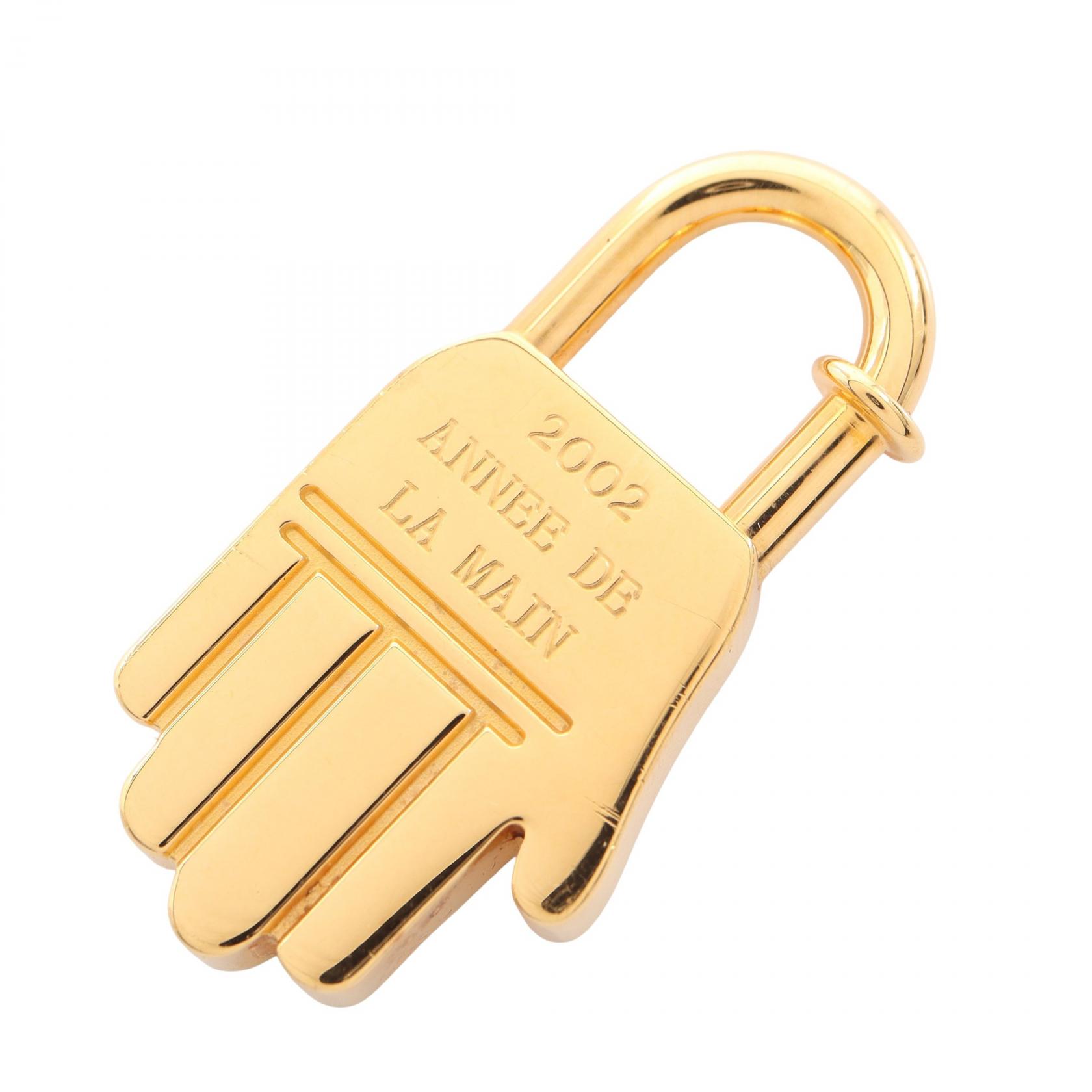 エルメス HERMES カデナチャーム ANNEE DE LA MAIN ハンドモチーフ 2002年限定 チャーム アクセサリー GP レディース ゴールド系 【中古】｜Brandoff銀座