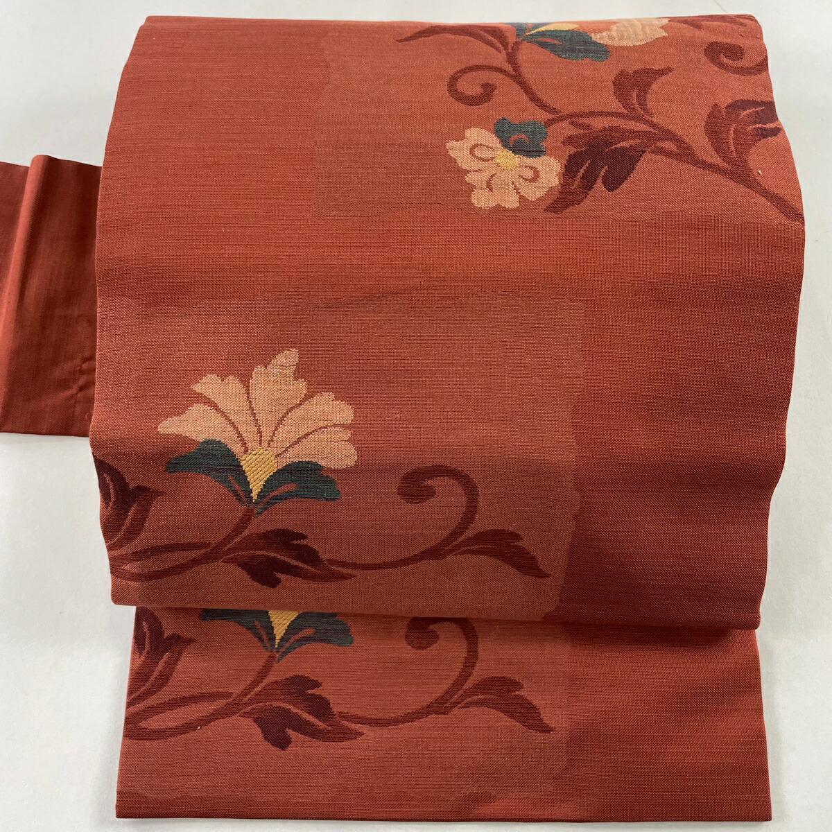 名古屋帯 美品 優品 花唐草 茜色 正絹