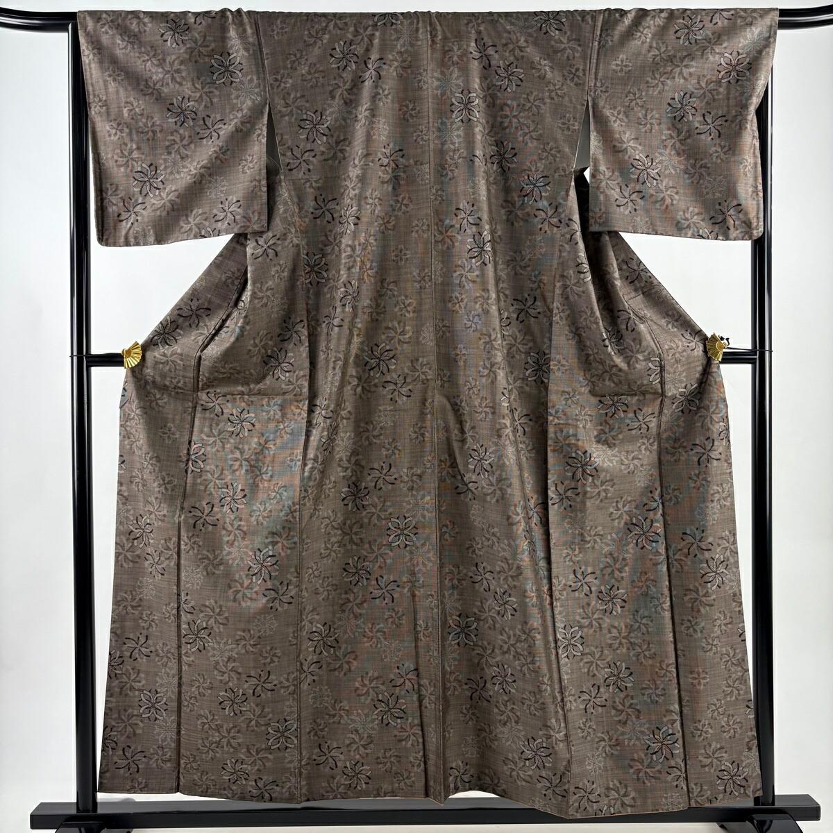 紬 身丈158.5cm 裄丈67.5cm L 袷 花 焦茶色 正絹 秀品 【中古】