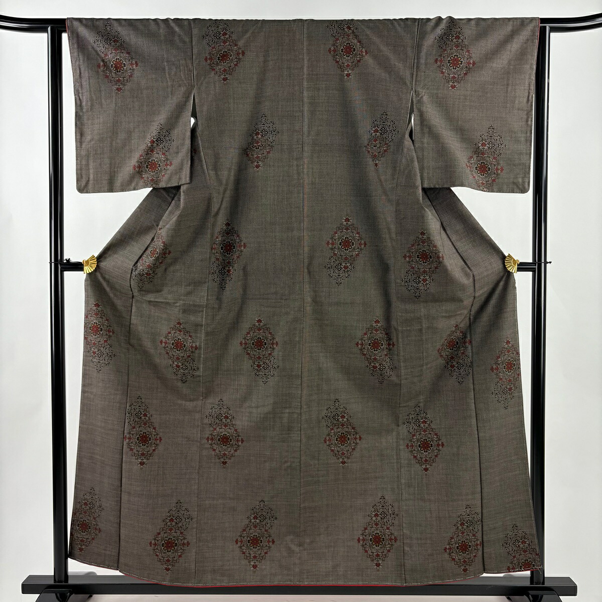 大島紬 身丈159cm 裄丈63.5cm S 袷 純泥染 証紙あり 華文 茶色 正絹 名品 【中古】