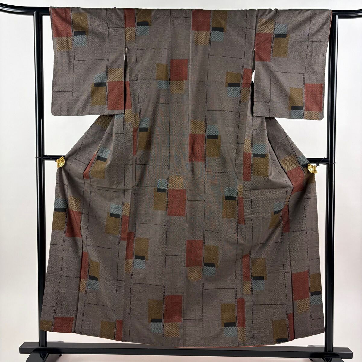 紬 身丈156cm 裄丈62.5cm S 袷 幾何学模様 焦茶色 正絹 秀品 【中古】
