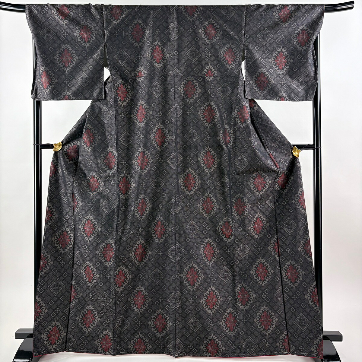 大島紬 身丈168cm 裄丈69.5cm L 袷 証紙あり 華文 斜格子 黒灰 正絹 名品 【中古】