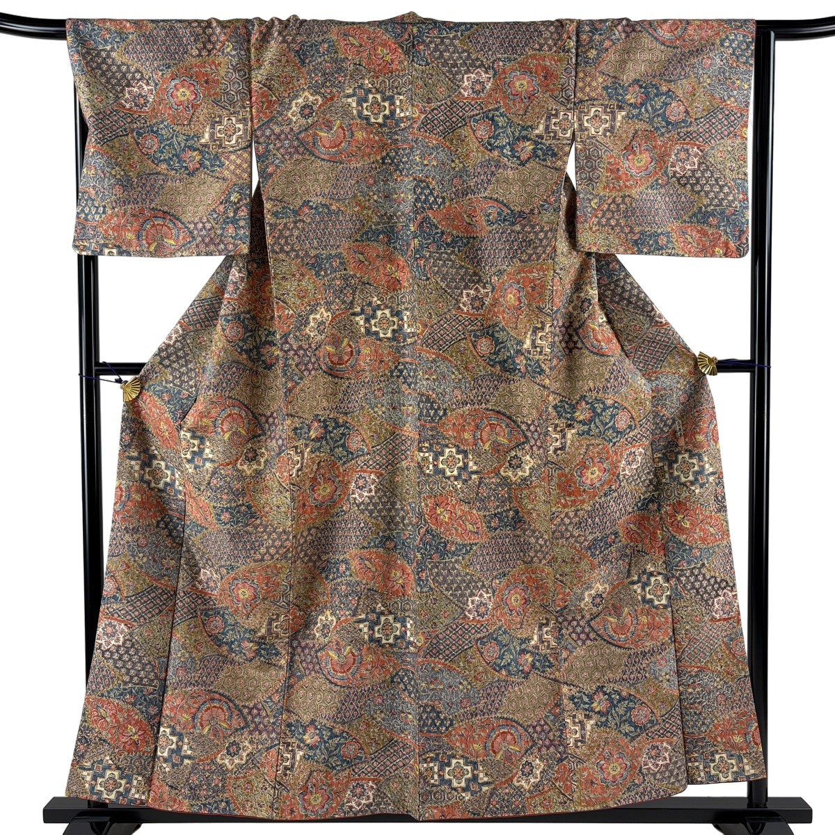 【美品】 小紋 身丈157.5cm 裄丈66.5cm M 袷 二代目 更甚 紬地 落款あり 草花 更紗 オレンジ 正絹 秀品 【中古】