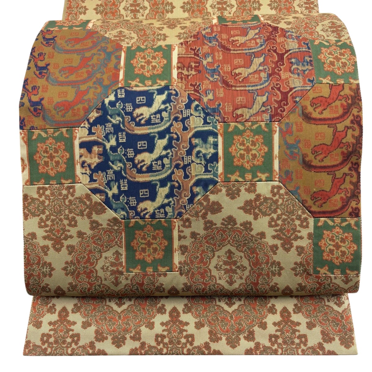 【美品】 袋帯 秀品 正倉院唐花文錦 蜀江文 切りばめ 薄黄土色 お太鼓柄 正絹 【中古】