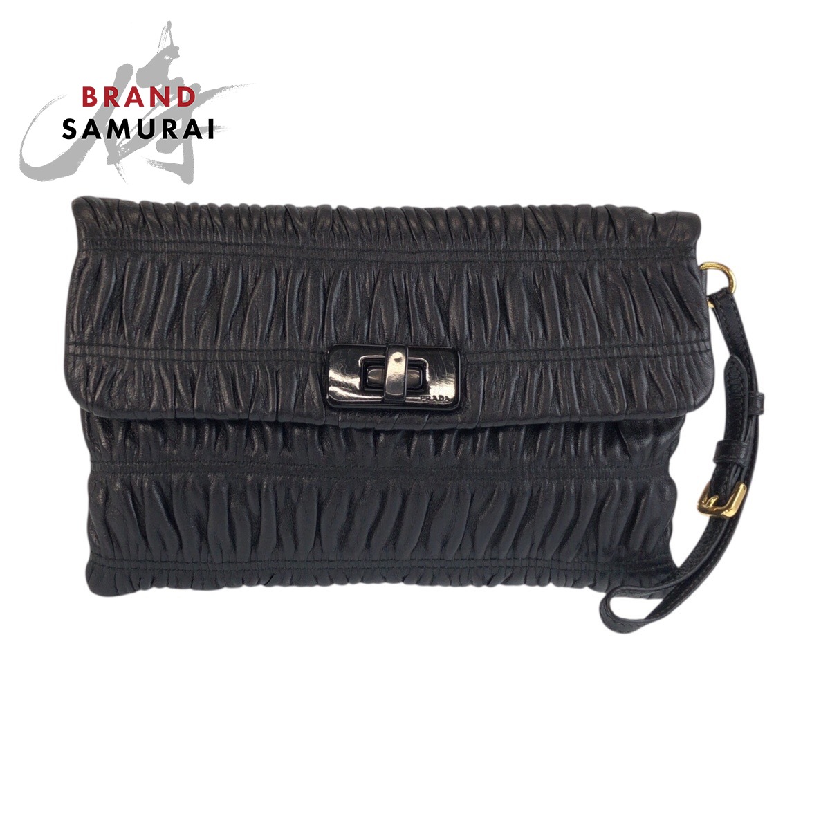 美品 PRADA プラダ 黒いこと 黒 ゴールド金具 なめし革 53 クラッチペダル御徒面子 合切袋 レディース 601224 【中古】