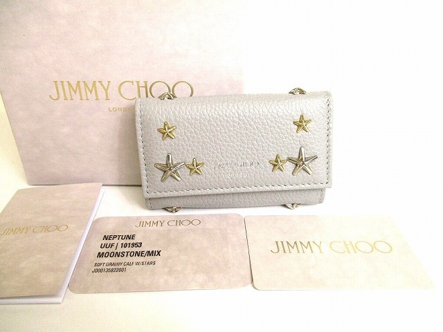 【未使用保管品】 ジミーチュウ Jimmy Choo メタル スタッズ シルバー金具 ネプチューン 6連 キーケース メンズ レディース グレー 【中古】 23,430円