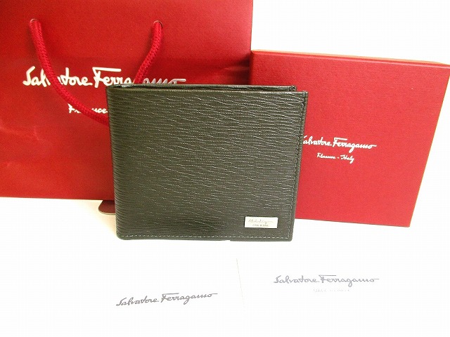 【未当てはめる倉入れ品】 サルバトーレ フェラガモ Salvatore Ferragamo ロゴタイプ本塁 なめし革 2つ折り 紙入れ コンパクトウォレット メンズ まっ黒い赤銅色×米国海軍 【中古】