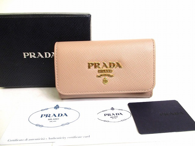 【未使用保管品】 プラダ PRADA サフィアーノ メタル レザー 4連 キーケース キーリング メンズ レディース CIPRIA (ベージュ) 【中古】