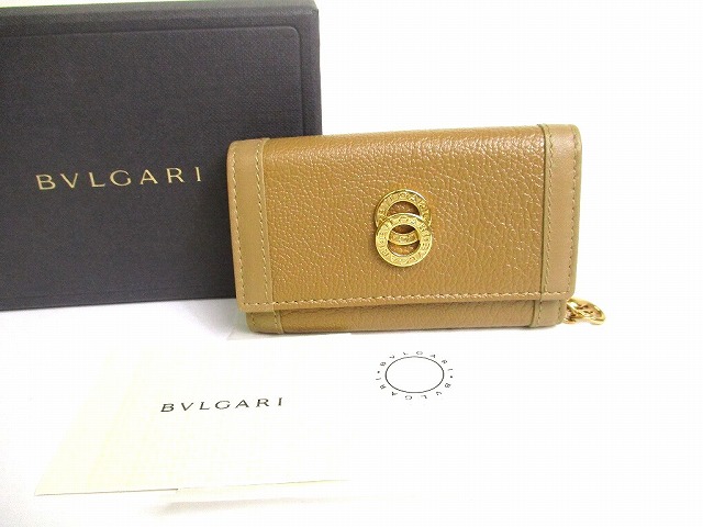 【新品同様】ブルガリ BVLGARI ドッピオトンド レザー ゴールド金具 6連 キーケース キーリング メンズ レディース 茶 【中古】｜東京のブランドショップ