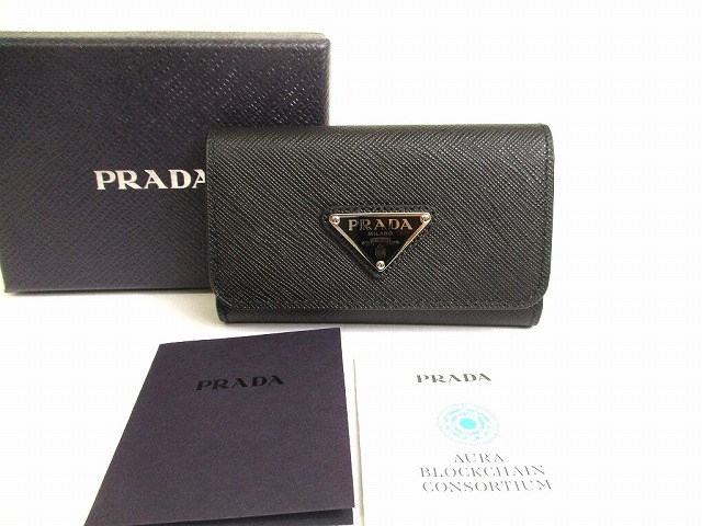 【未当て嵌める蔵置き品】 プラダ PRADA サフィアーノ ３角形 なめし革 しろがね色金具 4連 足懸かり入れもの 足懸かり輪っか メンズ レディース ネロ 黒 【中古】