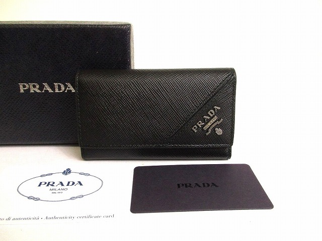 【未当て嵌める庫入れ品】 プラダ PRADA サフィアーノ 金属元素なめし革 6連 手当たり容れもの 手当たり輪っか 手当たりチェーン店 メンズ レディース 黒いこと×米国海軍 【中古】