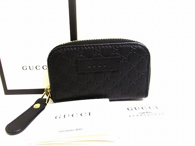 【未当て嵌める蔵置き品】 グッチ GUCCI シマ なめし革 ラウンドチャック 御釣り入れ 鋳貨銭入れ コインケース メンズ レディース 黒 【中古】