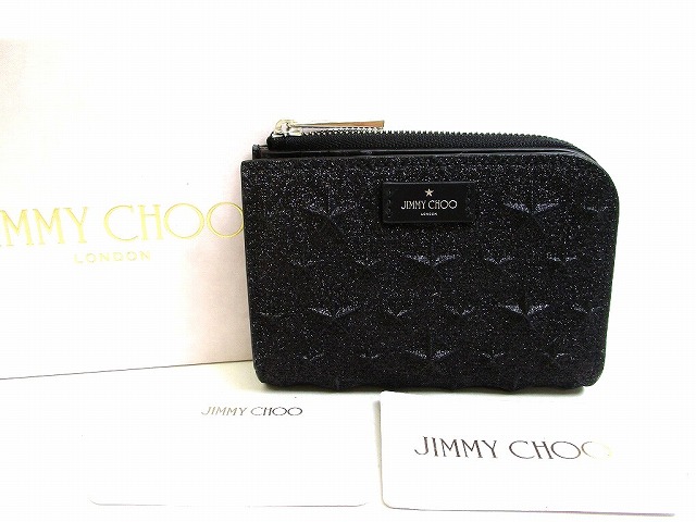 【未使用保管品】 ジミーチュウ Jimmy Choo エンボス スター COMPACT ZIP WALLET -M グリッターレザー 2つ折り 財布 コンパクト財布 メンズ レディース 黒 【中古】｜東京のブランドショップ 42,900円