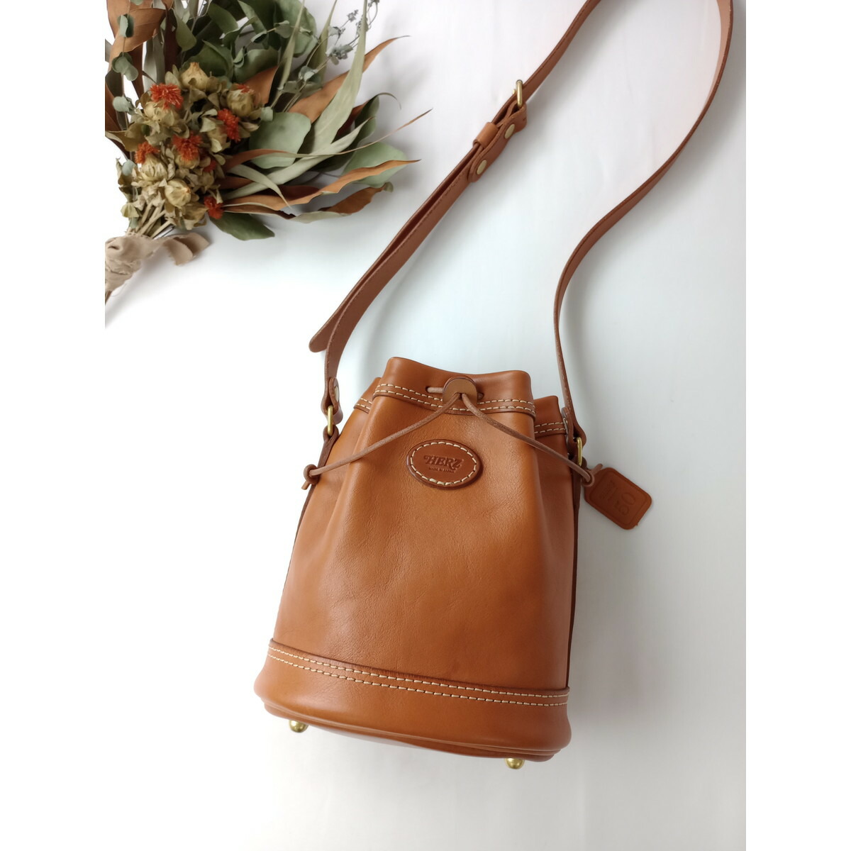 ヘルツ HERZ 巾着 ショルダー ポシェット CK-28 レザーショルダー バッグ ブラウン【中古】｜Branica Republic 15,323円