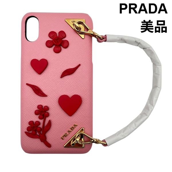 【中古】美品 プラダ PRADA 滅多に無い スマホケース PhoneXS 持ちはこぶ ロゴタイプ 持ち手 ハート型 花 ゴールド金具 さくら色 赤 なめし革 レディース 6V545