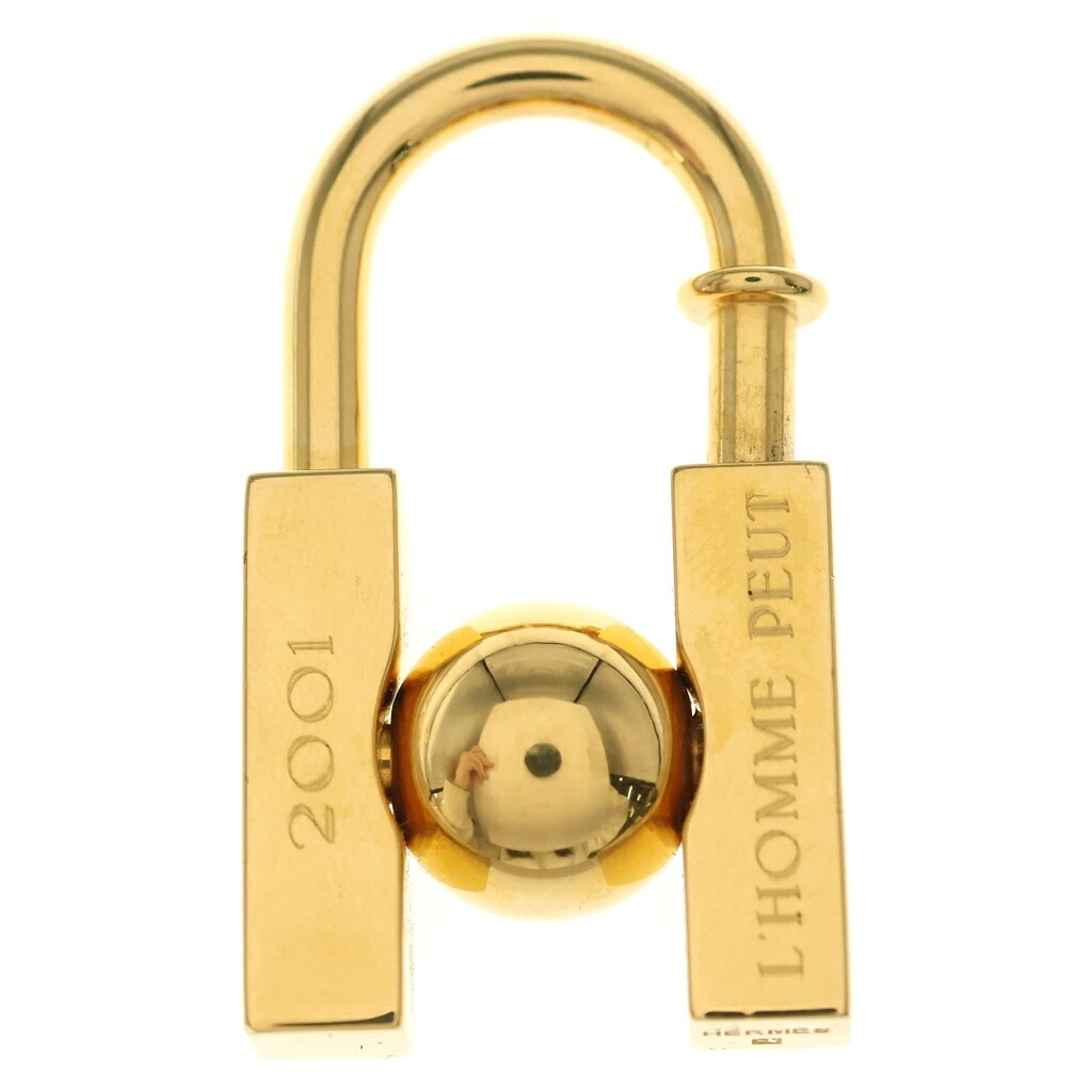 HERMES(エルメス) カデナチャーム L\u0027HOMME PEUT EMBELLIR 天使の都市 TERRE 未知なる大地の美を求めて 2001年押さえる ゴールド GP【中古】【度合いB】【色つやゴールド】【取りまわしバス発着場BRING京都河原町店】