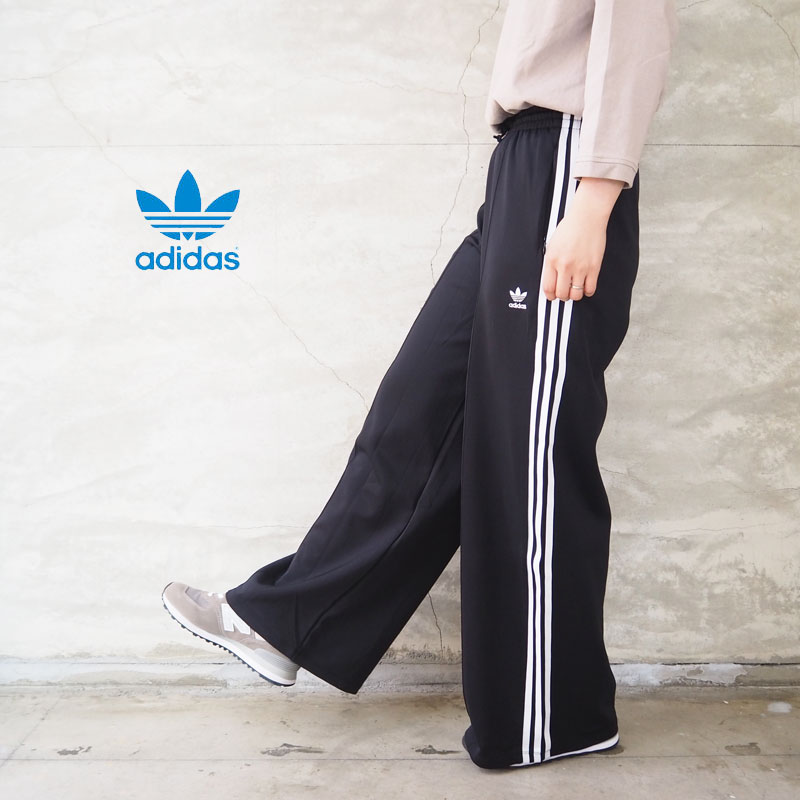 楽天市場 Adidas Originals アディダス オリジナルス パンツ レディース Relaxed Pants Iya47 ロングパンツ ワイドパンツ ジャージ シンプル スポーティ おしゃれ ウエストゴム レトロ ママコーデ ゆったり 黒 ブラック ロゴ ライン 3本ライン Good Holiday グッドホリデイ