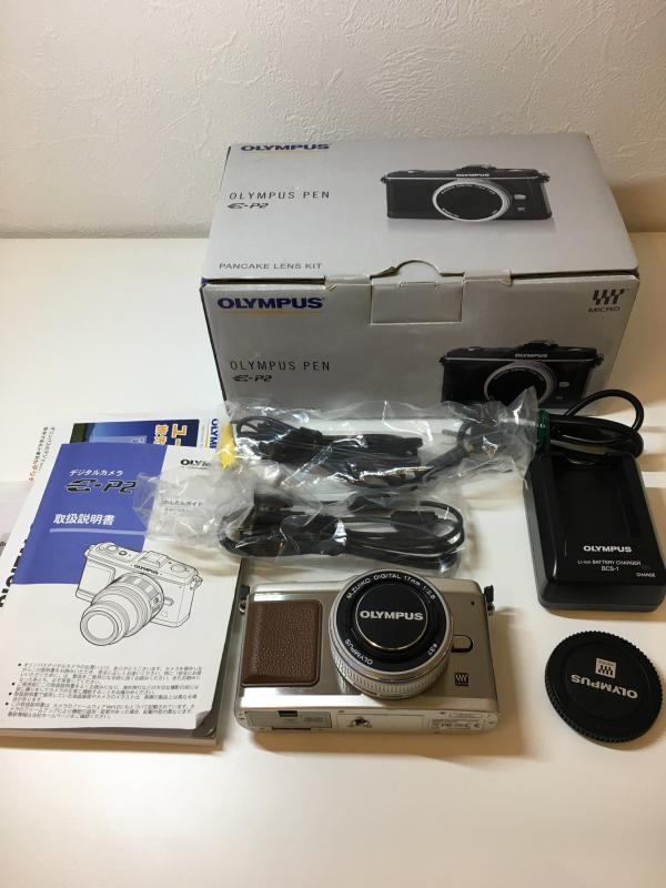 【中古】OLYMPUS 銀鏡受け答え一眼 PEN E-P2 ホットケーキ一揃いの道具 しろがね色 E-P2PKIT-SLV