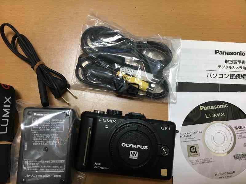 【中古】パナソニック 鏡鑑受け答え一眼写真機 GF1 水晶体一揃いの道具(20粍/F1.7ホットケーキ水晶体嘱する) 肝ったま黒いこと DMC-GF1C-K