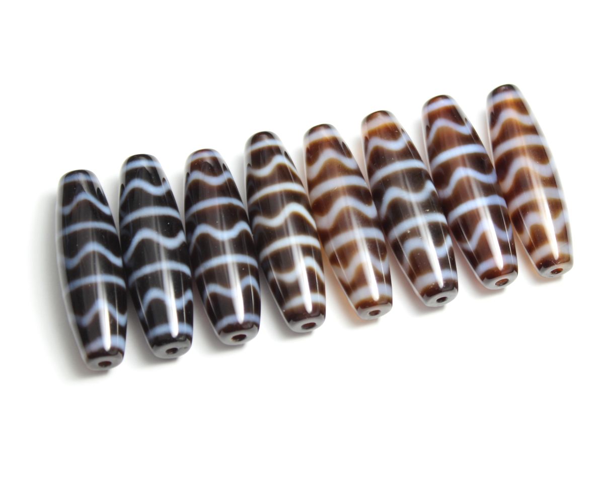 セール中！四線虎牙12ミリ×38ミリ 楽天市場】天珠 四線虎牙天珠 白 38×12mm ☆ 魔除け