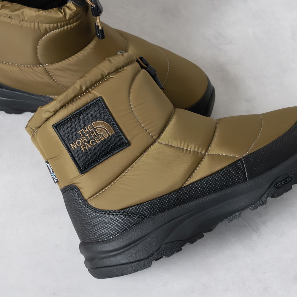 THE NORTH FACE [ザ・ノースフェイス]ヌプシ ブーティ お水校正刷り ロゴタイプ 遊撃手(ユニ一発やる) / Nuptse Bootie WP Logo Short4A NF52280 MG スノーブーツ / 防寒 / スポーティー / 心地好い / ナイロン /