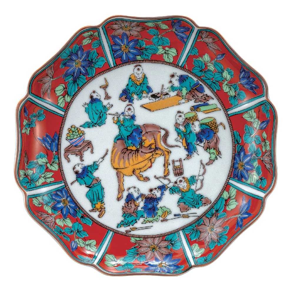 日本の伝統工芸品【九谷焼】7号皿 木米 付属の木箱は九谷焼の歴代画風の絵柄を入れた華やかなデザインとなっております。｜虹八-Kohya-