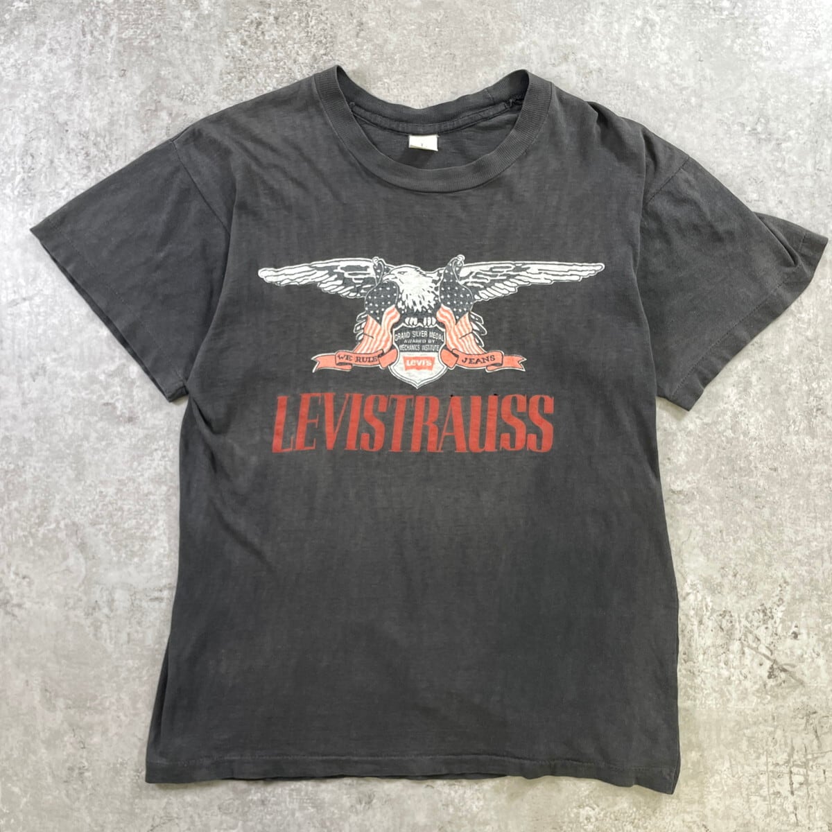 VINTAGE Levis リーバイス イーグル メダル Tシャツ メンズL シングルステッチ ヴィンテージ 古着 スミ黒色｜古着通販 cave古着屋