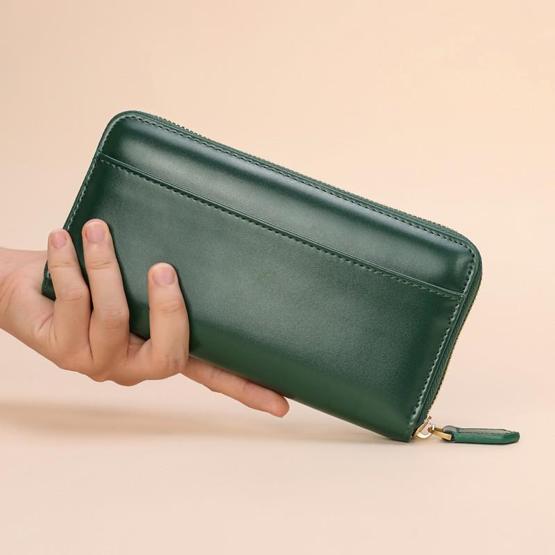 レディース 長財布 牛革 ジッパー 大容量 防盗 カードスロット ハンドバッグ 日常使い コンパクト 機能的 スタイリッシュ 収納力 高品質 女性向け 財布 手持ち バッグ アクセサリー 必需品