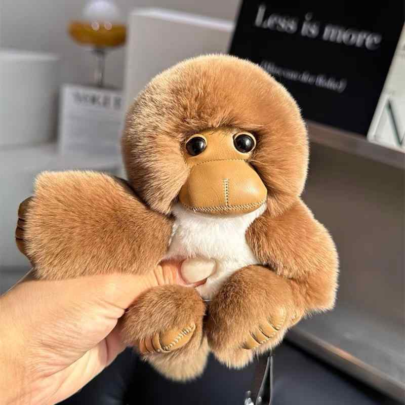キーホルダー 男女兼用 かわいい ぬいぐるみ サルモチーフ ふわふわ 毛?素材 車用 バッグチャーム 吊り下げ飾り 遊び心 アクセサリー 日常使い 軽量 コンパクト インテリア小物