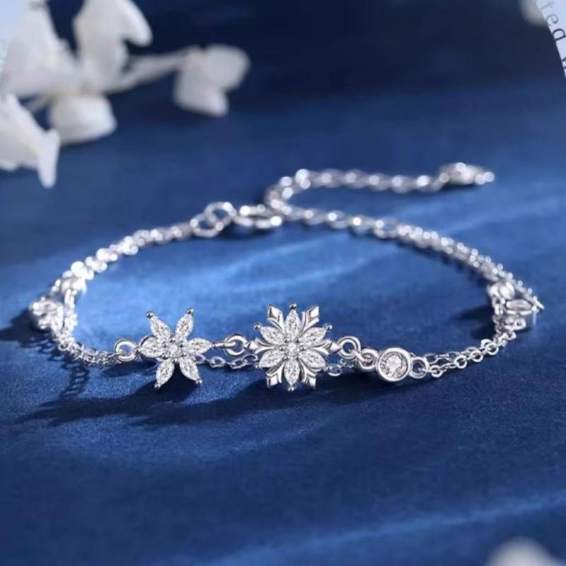 ブレスレット レディース 純銀 春夏 二層重ね 高級感 雪花モチーフ 女性用 手首アクセサリー 軽やかデザイン 日常使い 華奢タイプ スタイリッシュ 繊細加工 ギフト向き トレンドアイテム アクセントジュエリー