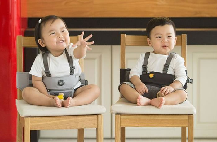 baby walking around furniture