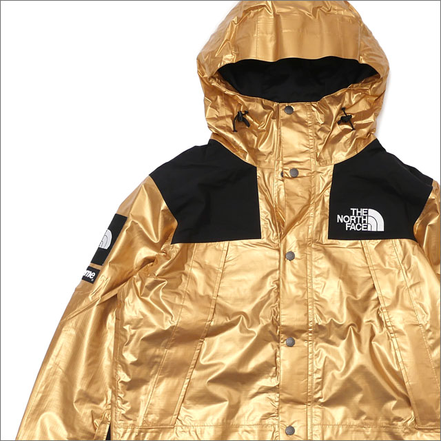 supreme x north face gold jacket