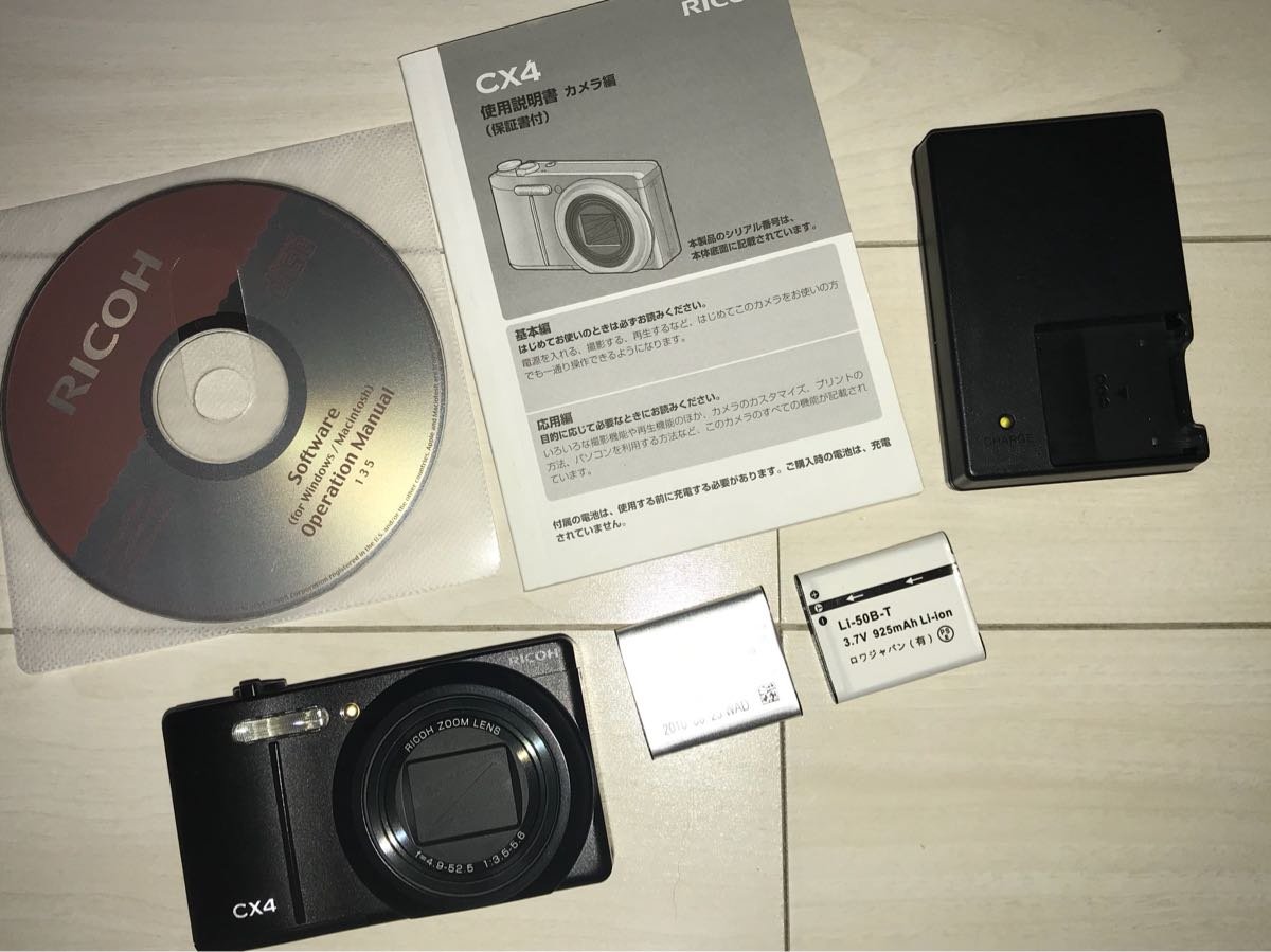 【中古】RICOH デジタル写真機 CX4 黒いこと CX4BK 1000万絵素後ろ側素っ破抜きCMOS 光学10.7倍望遠レンズ 広角28粍 3.0型液晶 高速道路連写