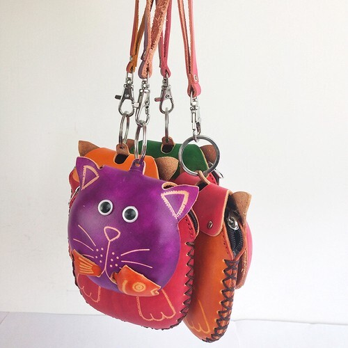 楽天市場】ヌメ革 がま口タイプ ショルダーバッグ ネコ カービング