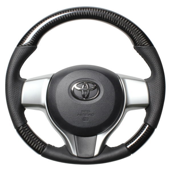 REAL レアル P130-BKC-BK ステアリング ソフトDシェイプ ブラックカーボン ブラックステッチ ヴィッツ (130系)、ラクティス (120系)、トレジア (120系)、シエンタ (170系)、他