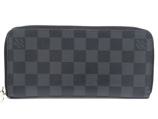 LOUIS VUITTON ルイ・ヴィトン 御徒面子 ジッピーウォレット・ヴェルティカル モノグラム・グラフィット ｻｲﾌ･小物 N63095 長札入れ PVC 黒いこと メンズ【中古】 バッグ・小物・ブランド雑貨-財布・ケース