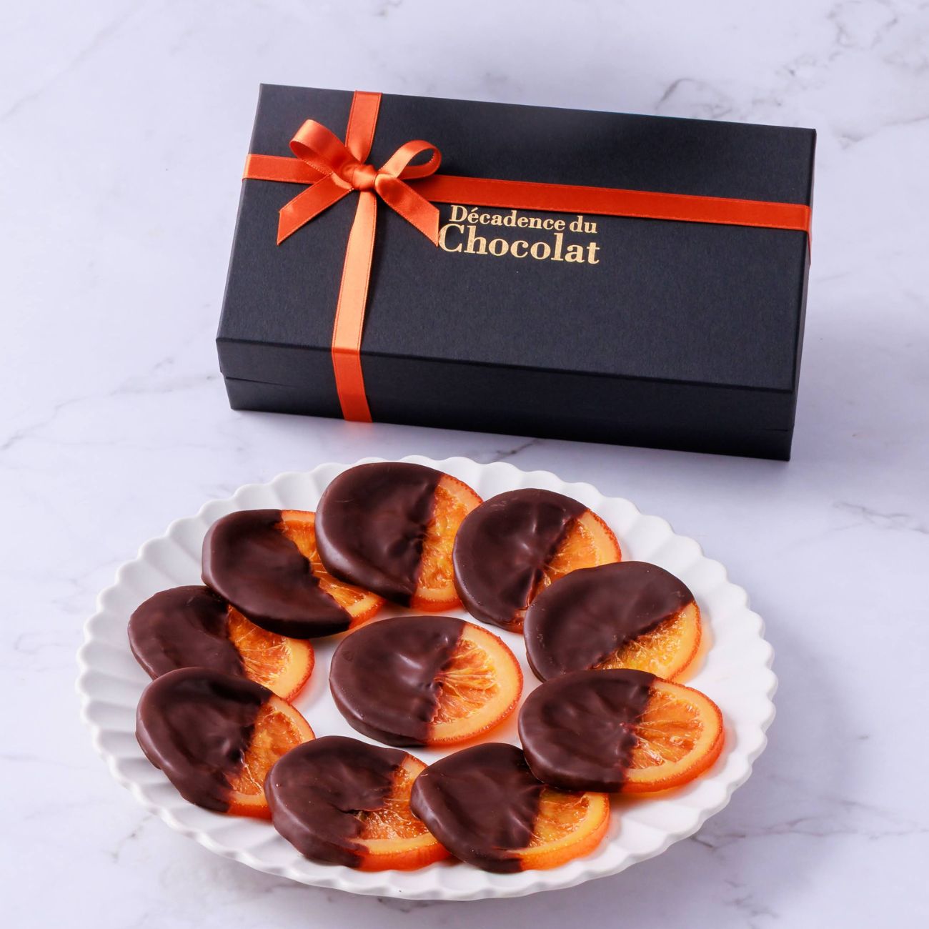 バレンシア（10枚入り）バレンタイン valentine お菓子 ご挨拶 手土産 プレゼント 一番人気 オランジェット オレンジ チョコレート オランジュ 高級 チョコレート ご褒美チョコ スイーツ おしゃれ フルーツチョコ カカオ58％ カカオ61％ デカダンス decadence du chocolat画像