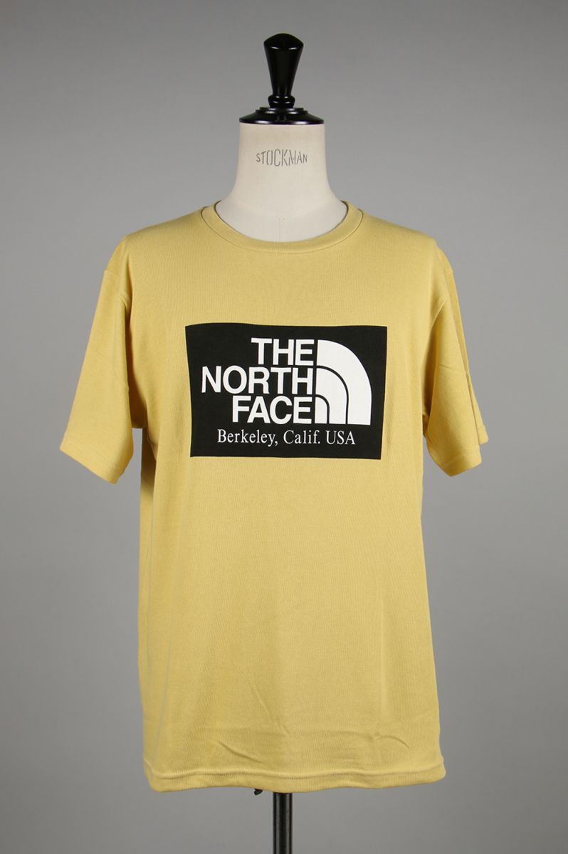 mustard north face t shirt