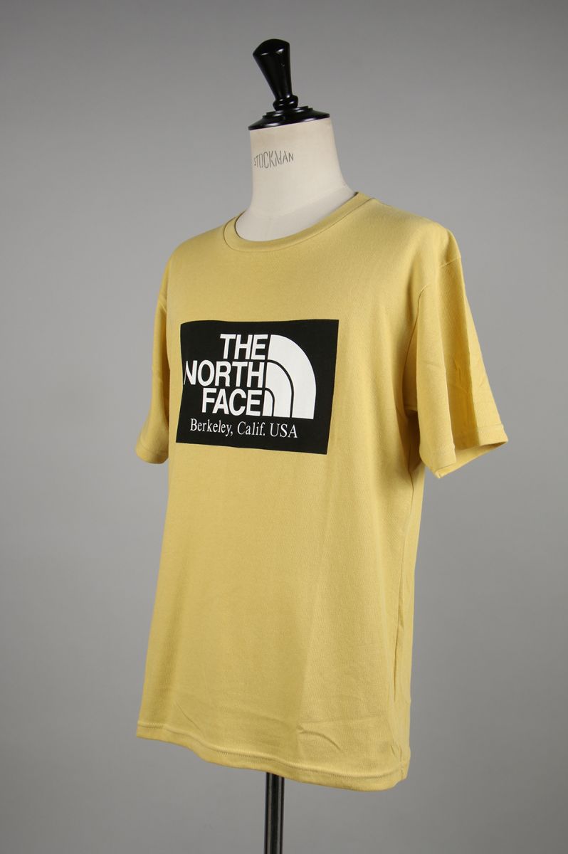 mustard north face t shirt