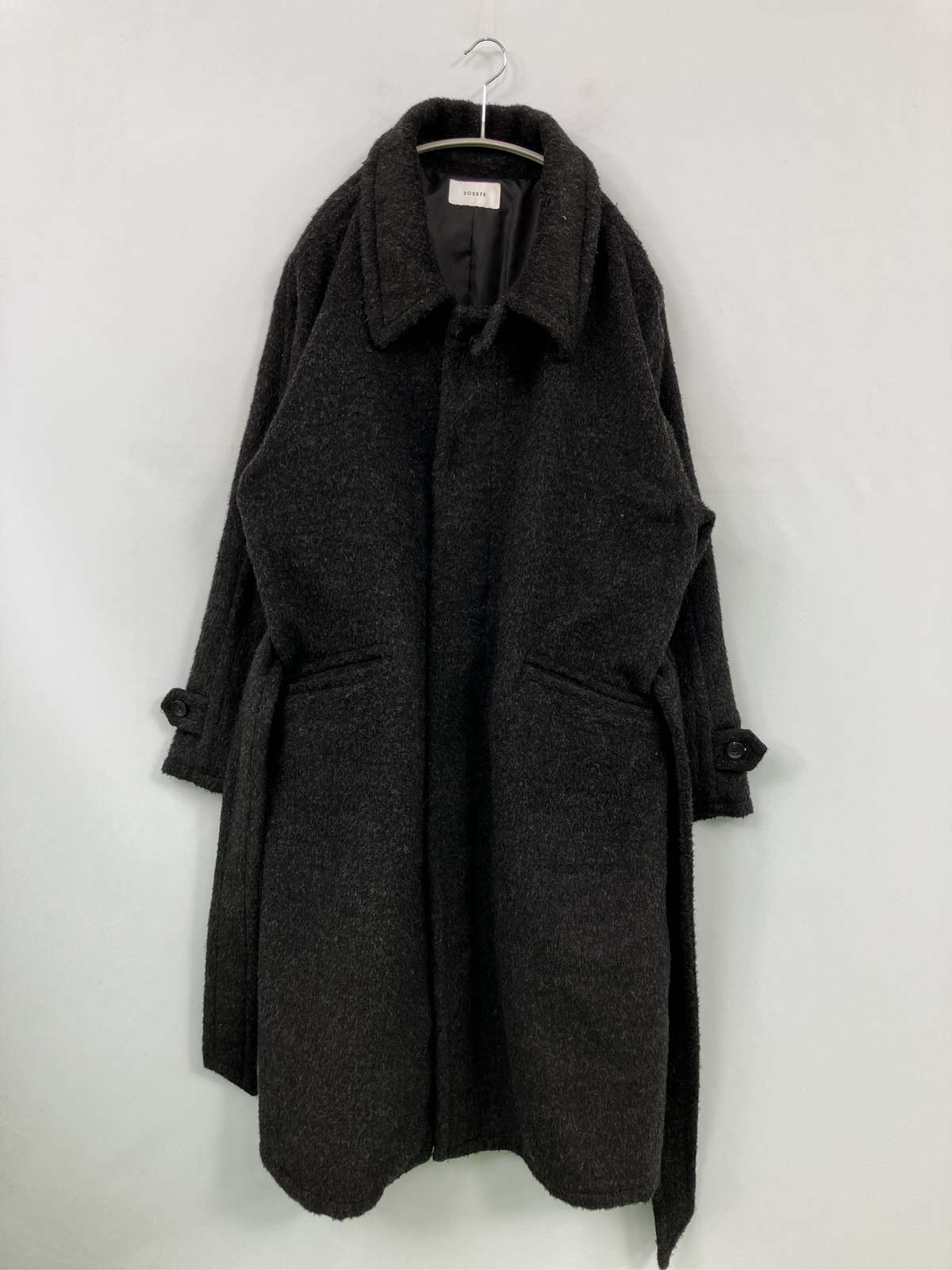 【中古】soerte ソエルテ ステンカラー厚地の外套 2 黒いこと 羊毛・編み物 無地 ロング丈 ボンネットなし メンズ レディース