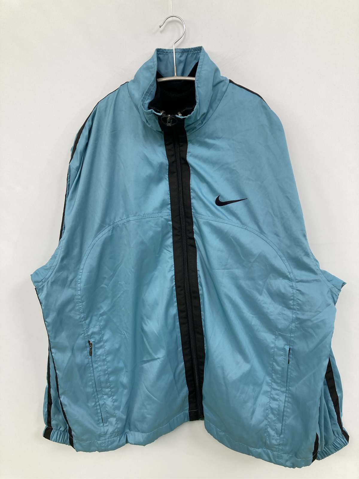 【中古】NIKE ナイキ ナイロン上衣 L 天の原青み 無地 ワンポイント ブランド名ロゴタイプ ボンネットなし メンズ