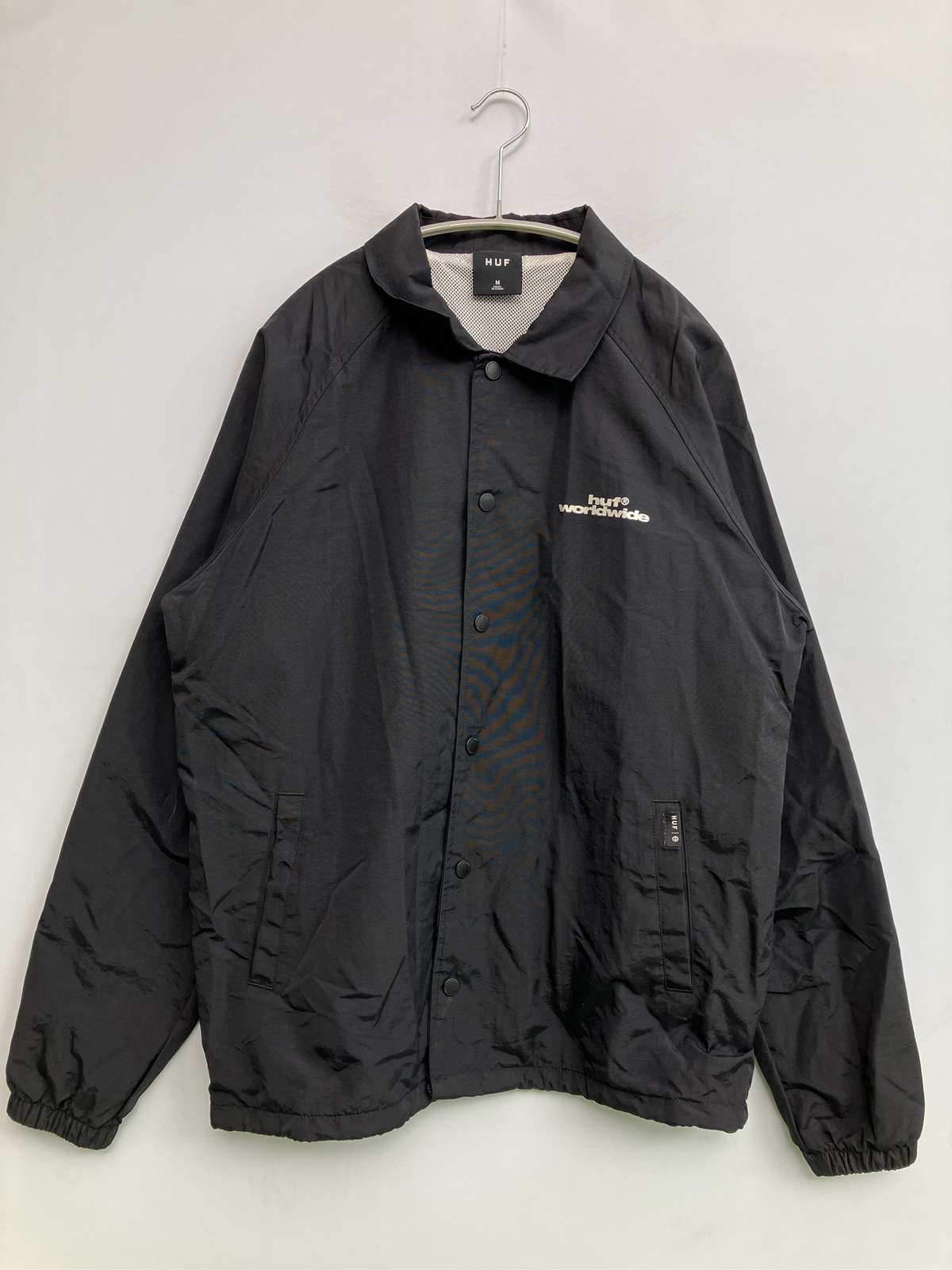 【中古】HUF ハフ ナイロン上衣 M 黒いこと 無地 向こう正面刷り上げる うしろ側刷り上げる ブランド名ロゴタイプ ボンネットなし メンズ