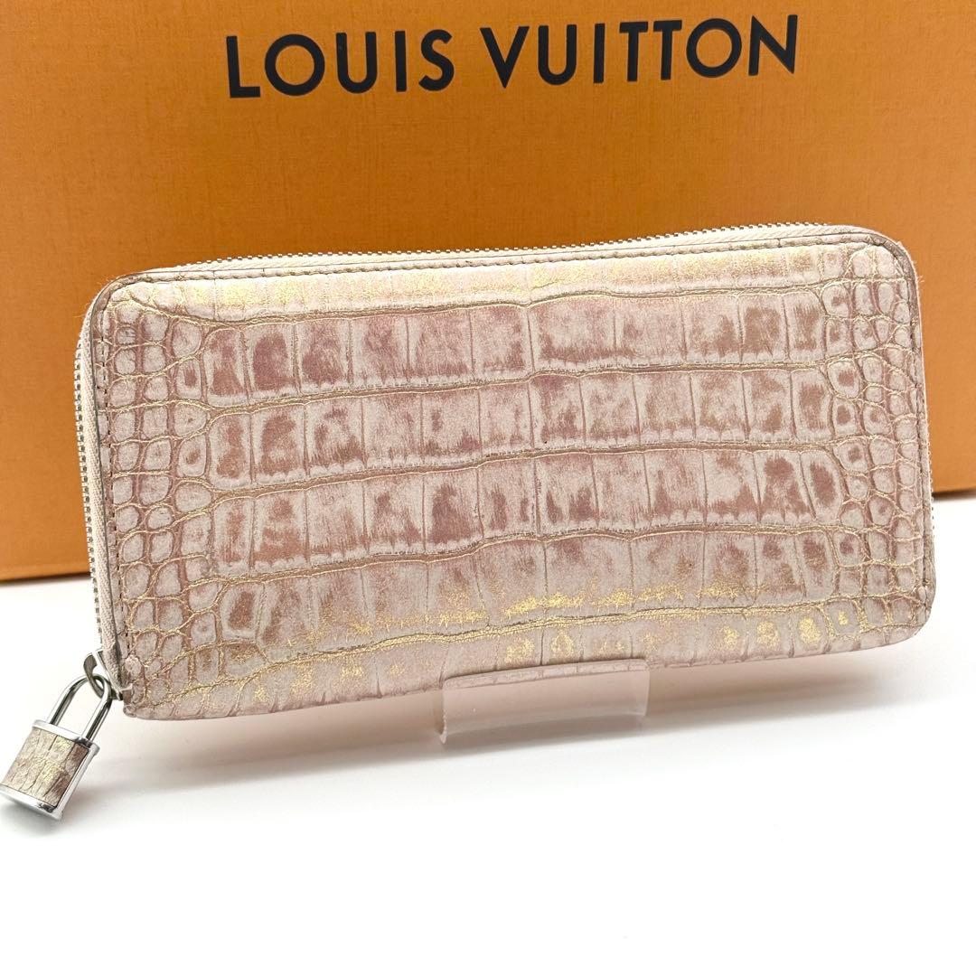 中古AB ルイヴィトン クロコダイル ジッピーウォレット 長銭入れ サクラ色 ゴールド LOUIS VUITTON カデナ 南京錠 LV しろがね色金具 リフレクター アリゲーター 異国的