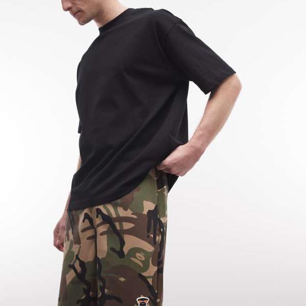 ア・ベイシング・エイプ AAPE BY A BATHING APE Aape by A Bathing Ape ルーズフィットジャージーショーツ（化けの皮柄） ズボン下 下つ方 メンズ 成人男性 インポートブランド ごく小さい大きさから大層らしい大きさまで