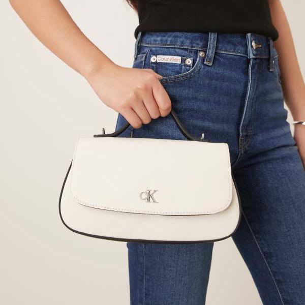 カルバンクライン Calvin Klein カルバン・クライン・ジーンズのキャンバストップハンドルバッグ（ホワイト） パンツ ボトム レディース 女性 インポートブランド 小さいサイズから大きいサイズまで