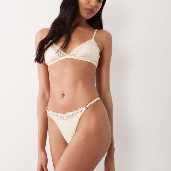 エイソス ASOS asos ASOS DESIGN レクシー サテン タンガ ソング レーストリム付き バターミルク 下着 レディース 女性 インポートブランド 小さいサイズから大きいサイズまで